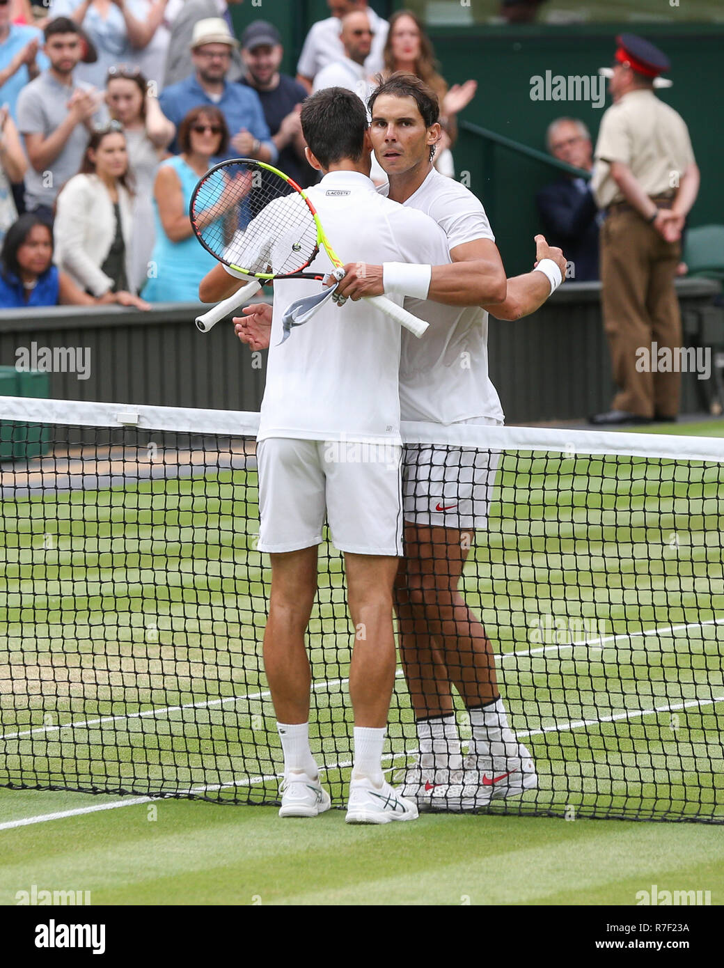 Novak Djokovic and Rafael Nadal hug after the match at Wimbledon, London, Great Britain, United Kingdom Stock Photo