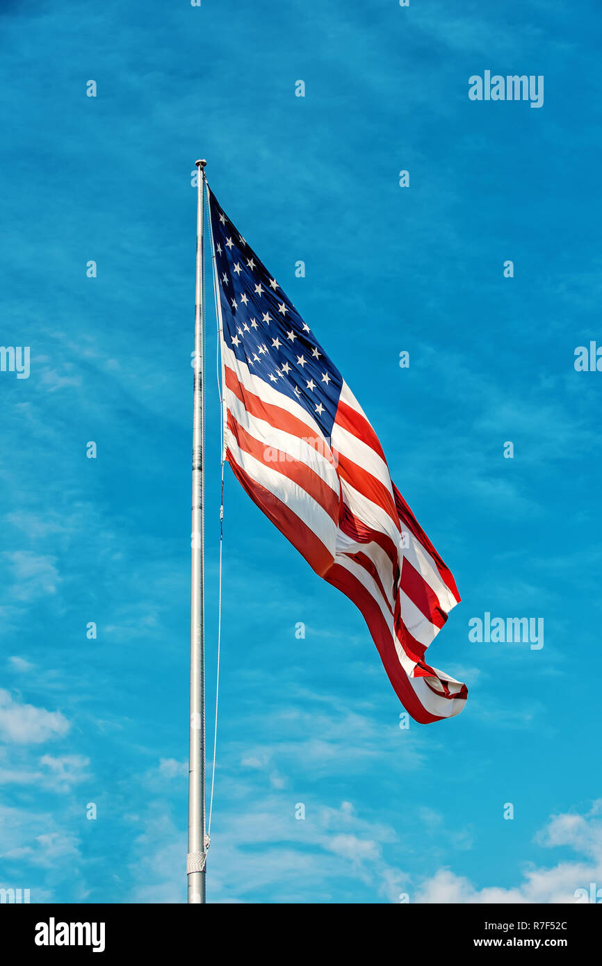American flag against blue sky at summer day Stock Photo