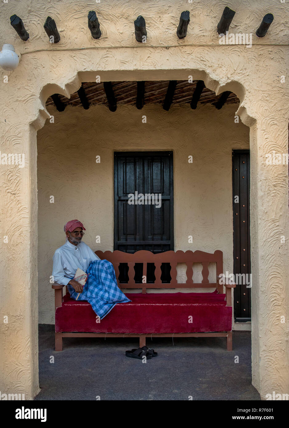 man stand with traditional dress on traditional sitting from Doha,Qatar,march,2014 Stock Photo