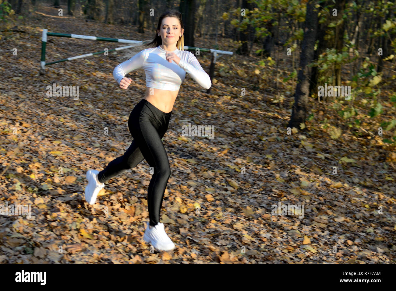 Blonde girl in black leggings hi-res stock photography and images - Alamy