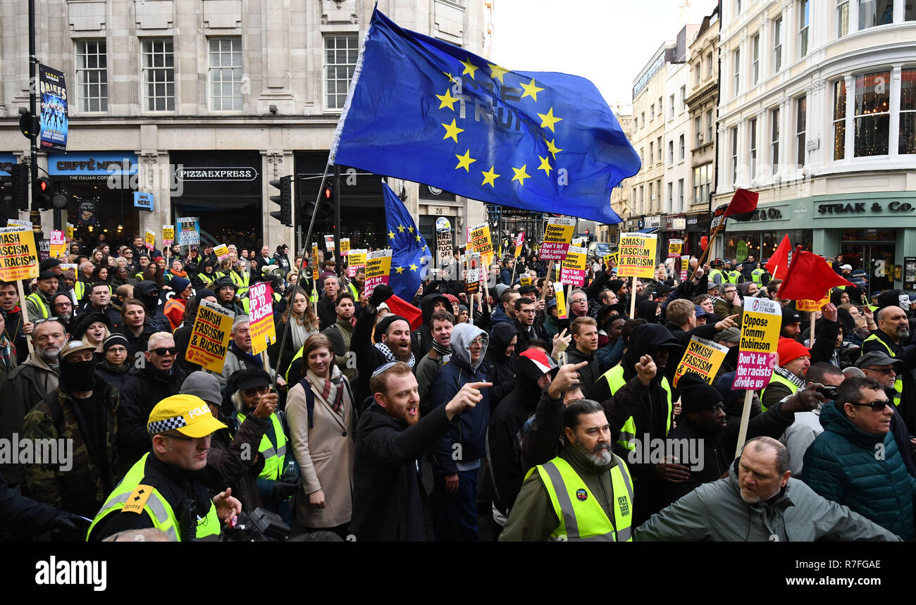 People take part in an anti-fascist counter-demonstration against a 'Brexit Betrayal' march and rally organised by Ukip in central London. Stock Photo