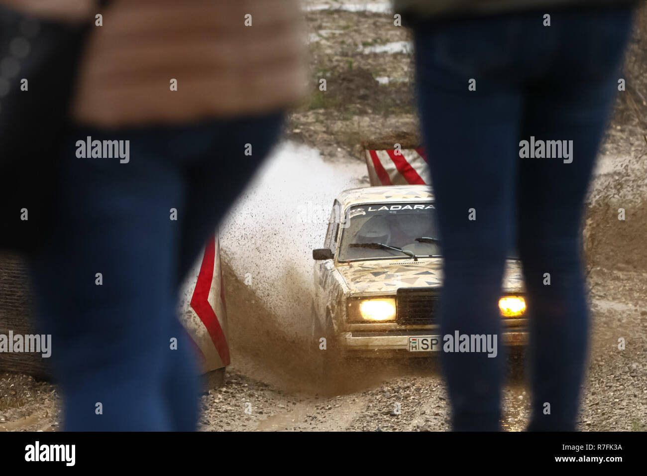 Sveta Nedjelja, Croatia - November 25, 2018. 9th Rally Show Santa Domenica. Spectators watching race from the muddy dam of Szilard Szabo and Dominika  Stock Photo