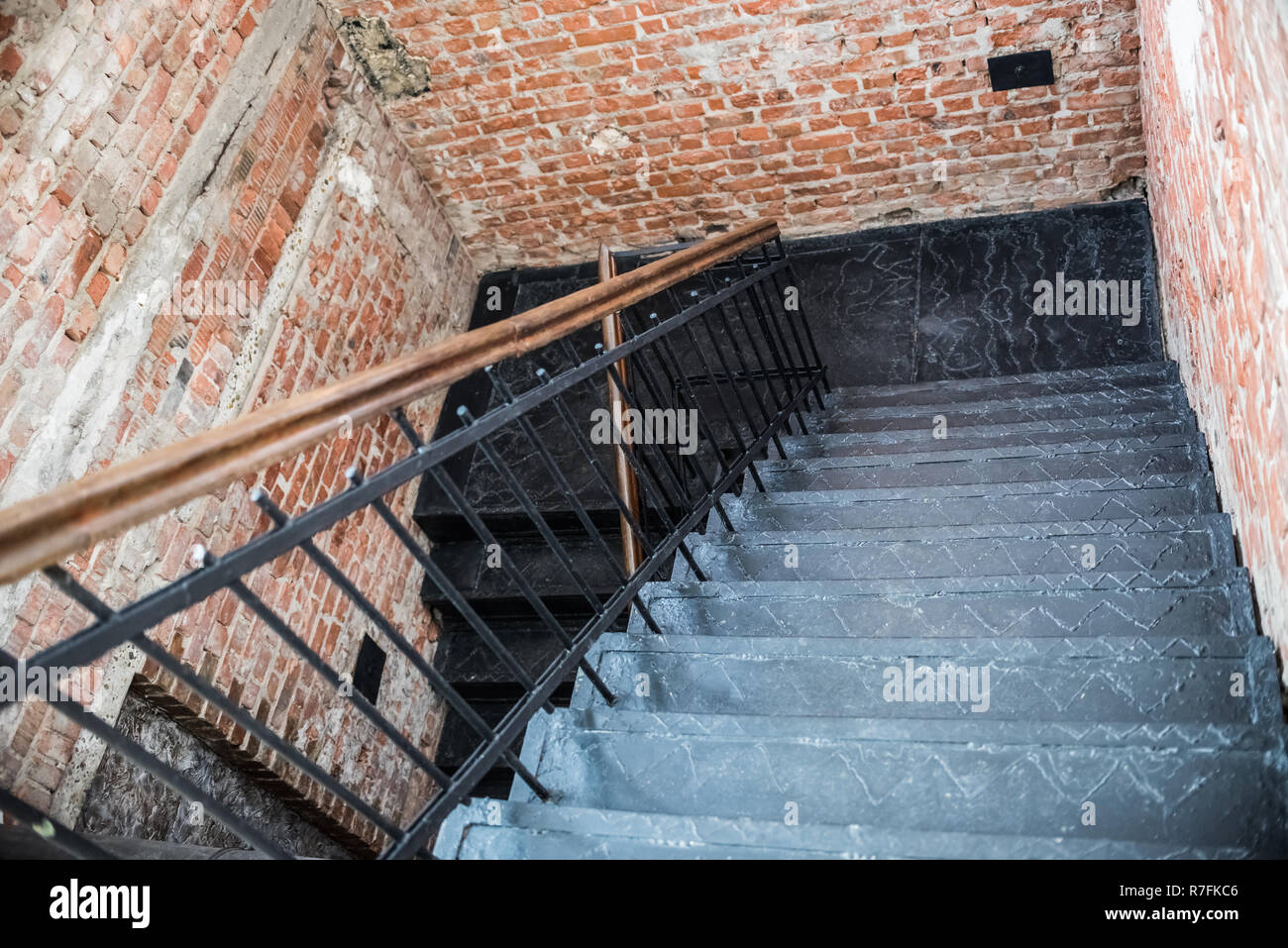 black iron staircase brick wall, creative space. loft office. coworking. top view Stock Photo