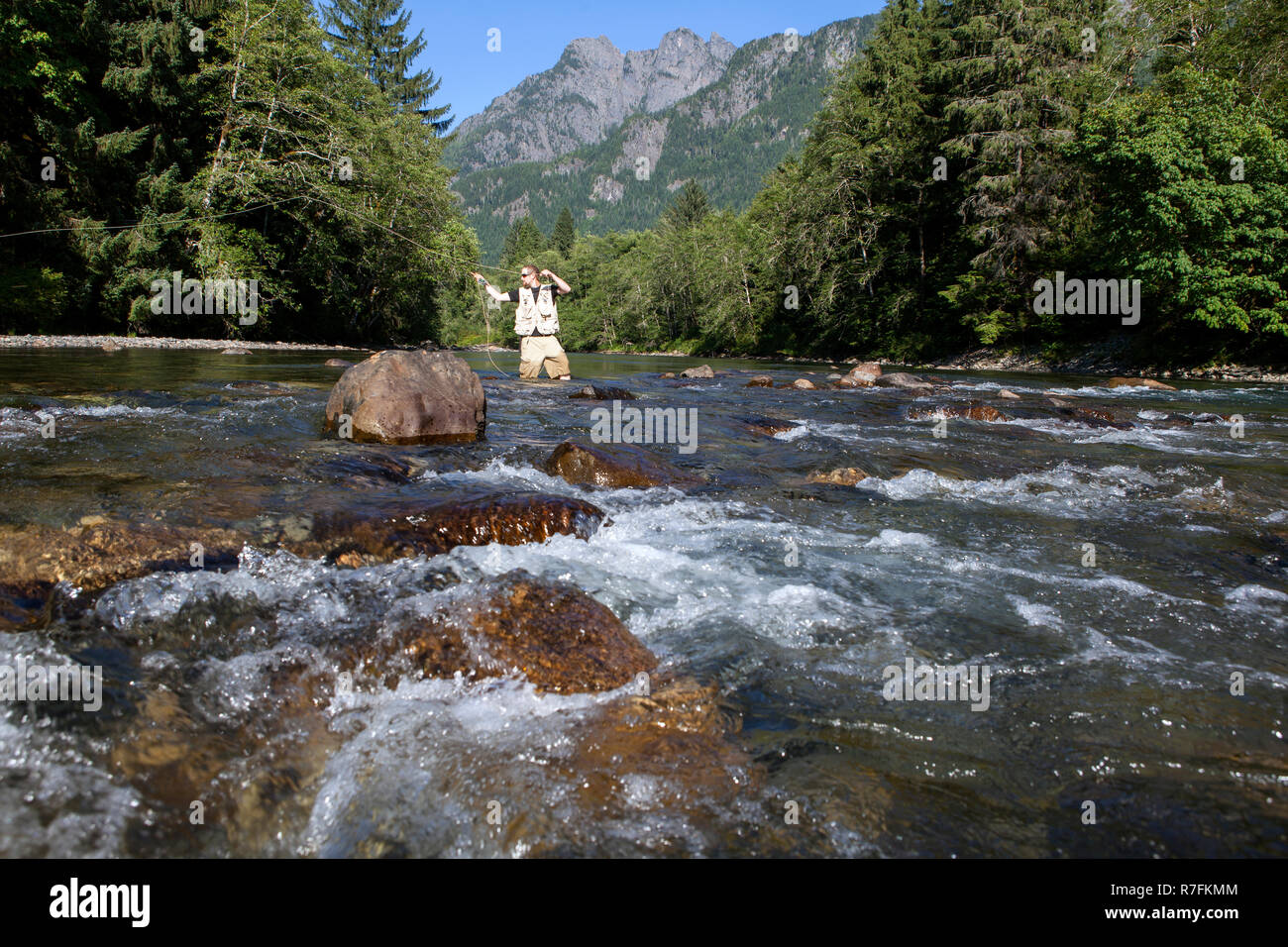WA09153-00...WASHINGTON - Fly fishing on the Middle Fork of the Snoqualme River near North Bend. (MR# J9) Stock Photo