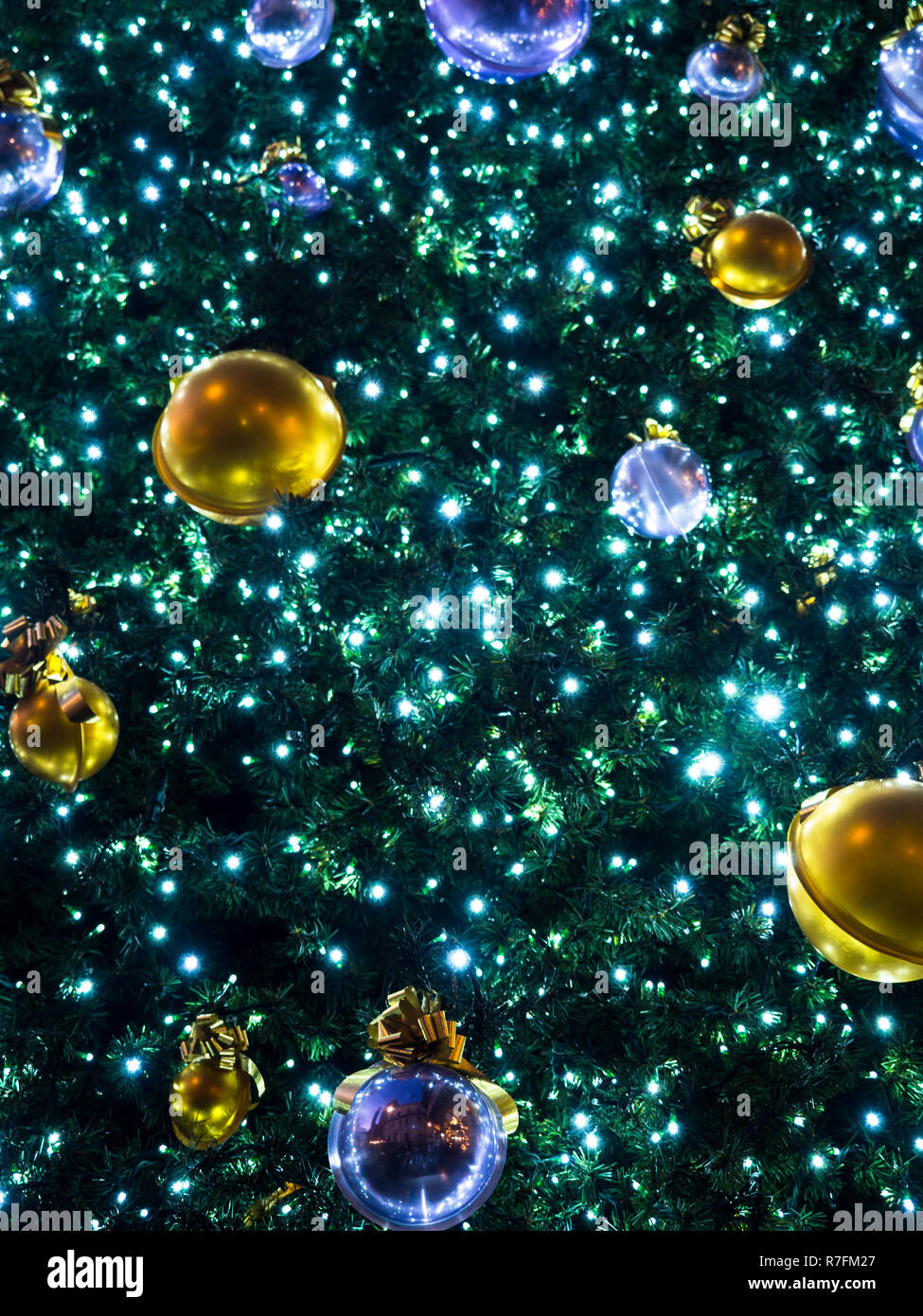 Christmas background formed from the detail of an illuminated Christmas tree. Stock Photo