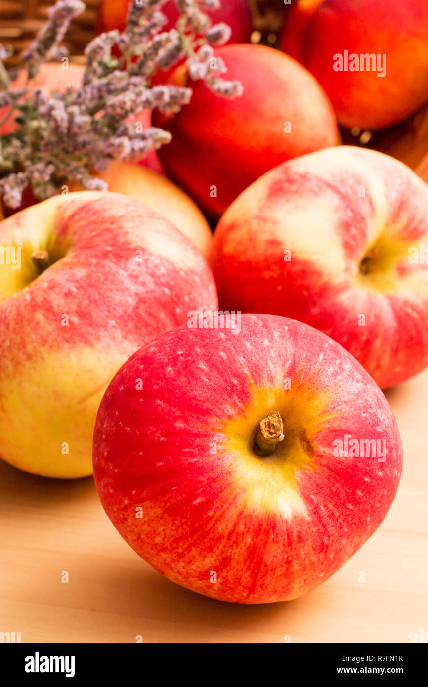https://c8.alamy.com/comp/R7FN1K/autumn-crop-background-with-close-up-ripe-red-apples-and-bunch-of-dry-herbs-R7FN1K.jpg