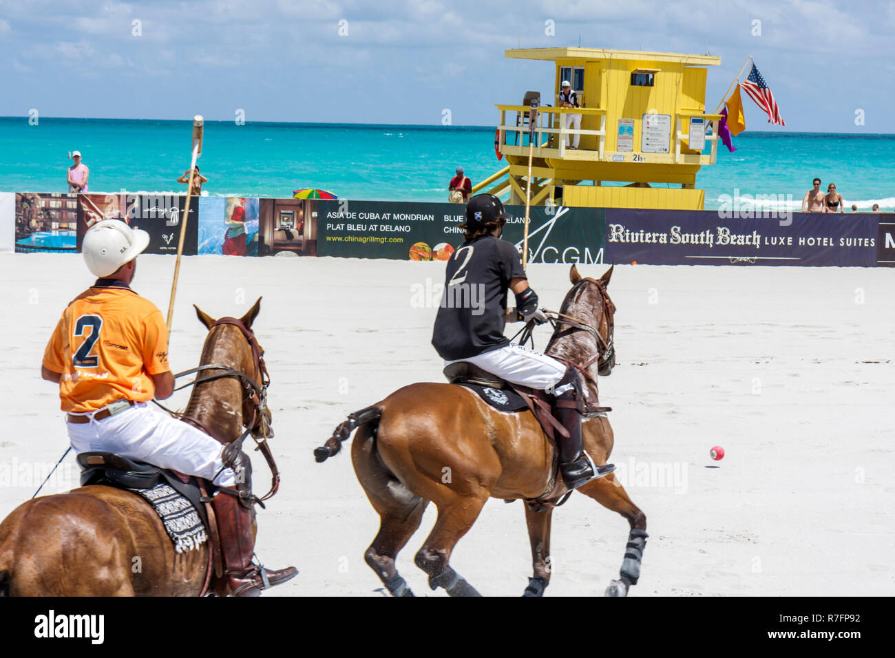 Miami Beach Florida,Atlantic Ocean,water,Polo World Cup Matches,sport,tournament,equestrian sand field,Hispanic man men male adult adults,player,pony, Stock Photo