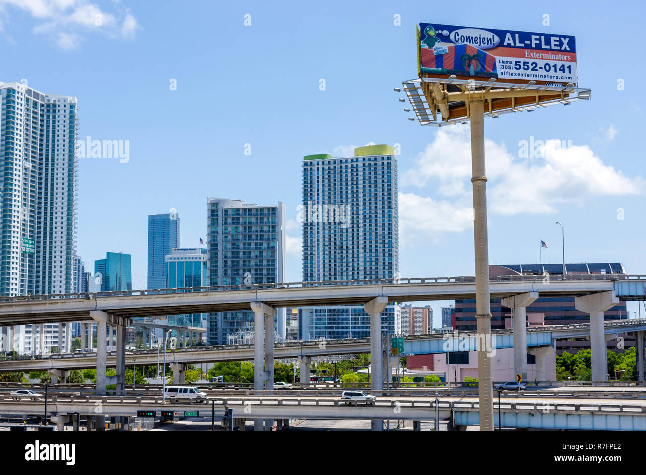 Miami Florida,Interstate 95,I 95,roadway,expressway,highway,elevated road,car,skyline,building,billboard,advertisement,ad,ad,advertising,ad,exterminat Stock Photo