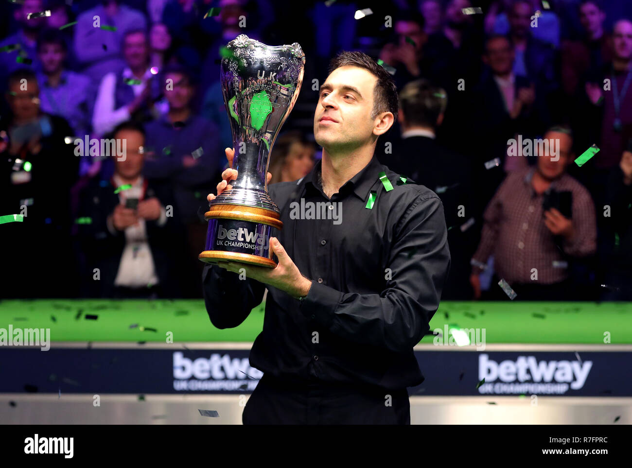 Ronnie O'Sullivan with the trophy after winning the Betway UK Championship at The York Barbican. Stock Photo