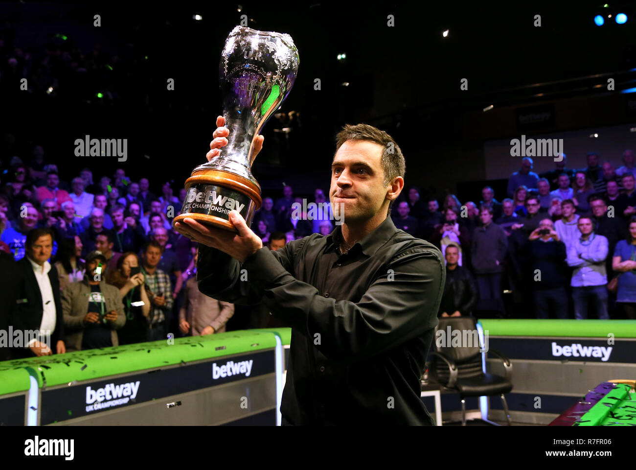 Ronnie O'Sullivan with the trophy after winning the Betway UK Championship at The York Barbican. Stock Photo