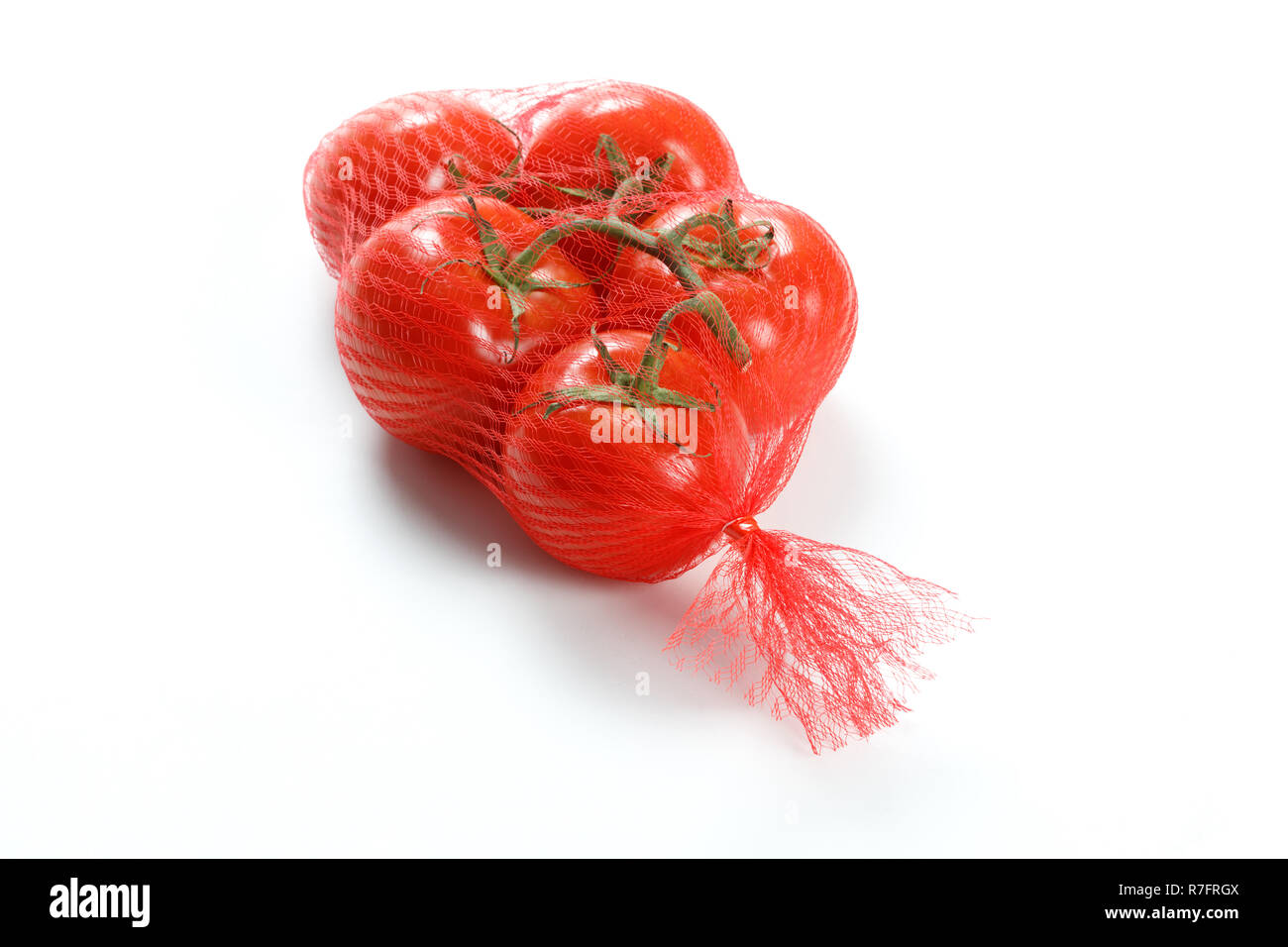 Red Tomato Group isolated on white background Stock Photo - Alamy