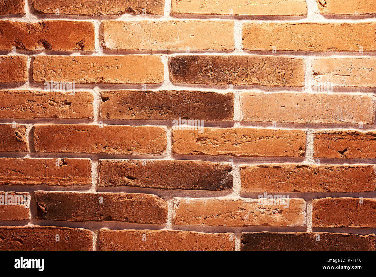 Red brick wall surface. Aged clean brick wall Stock Photo
