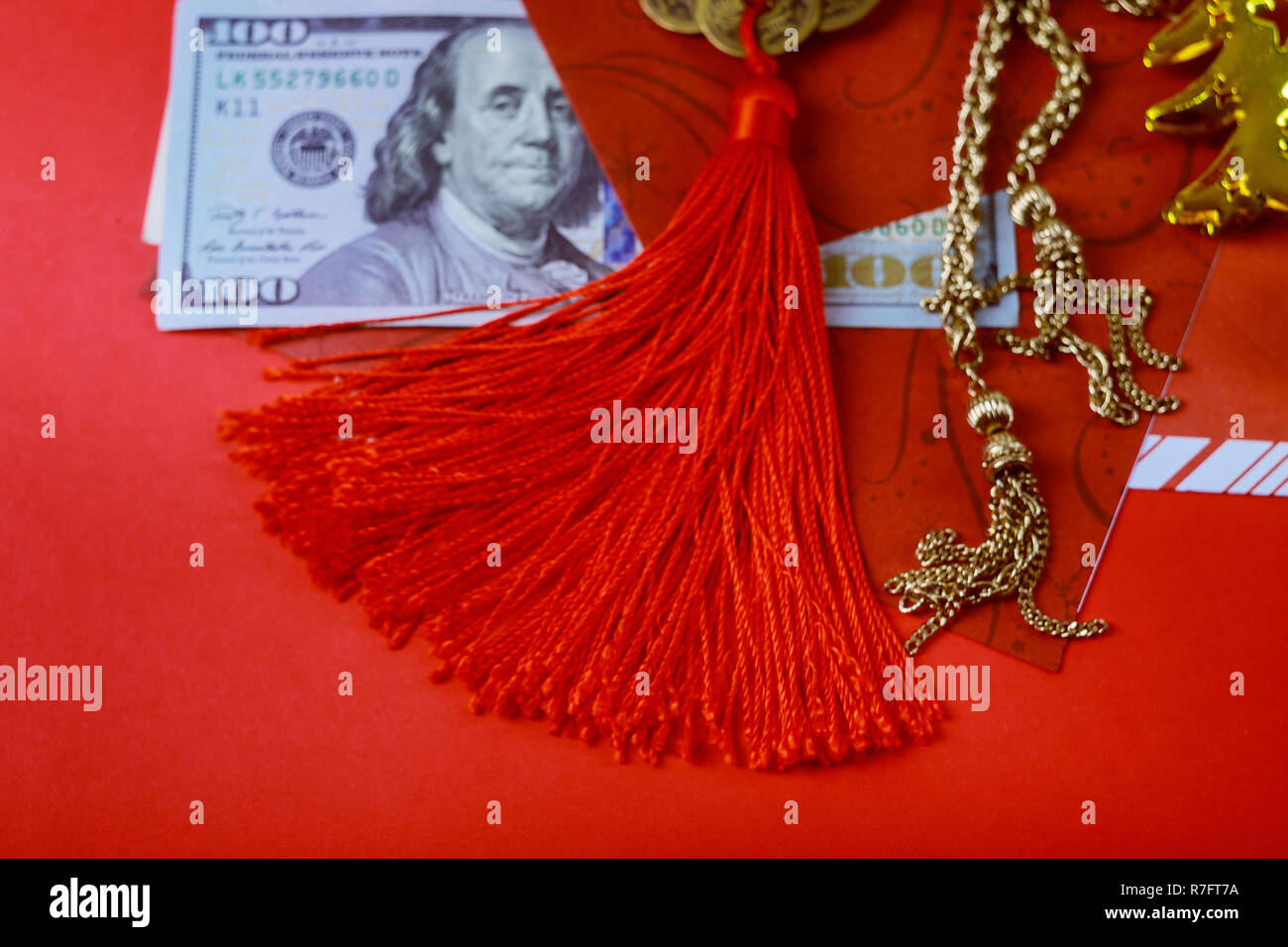 Chinese new year greeting with happy money envelopes, US dollar