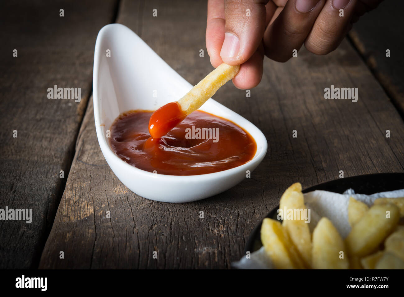 Chip shop chip dripping tomato ketchup Stock Photo Alamy