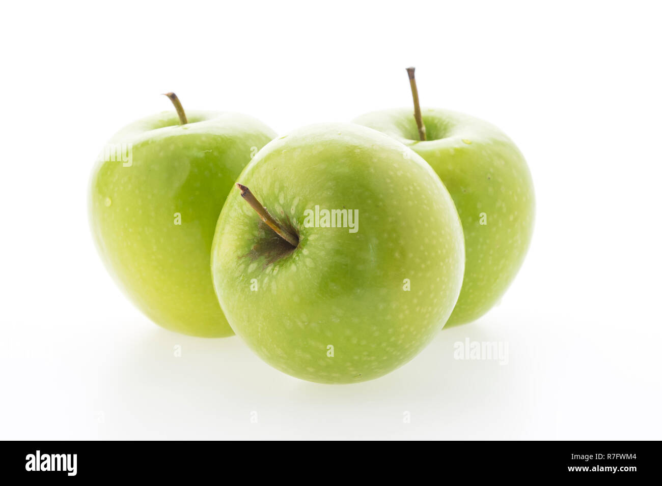 Green apple isolated on white background Stock Photo - Alamy