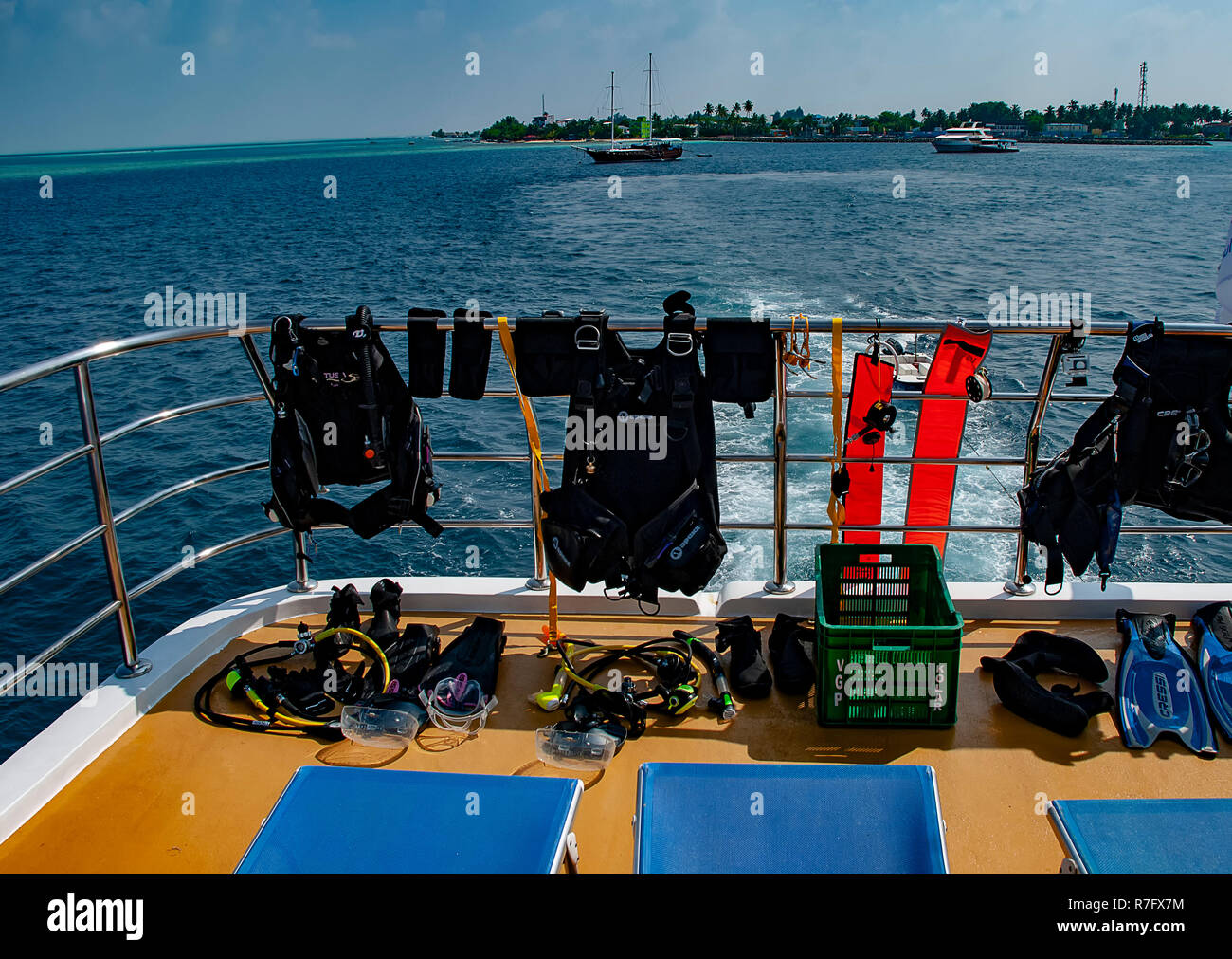 Scuba diving equipment drying in the sun on the deck of a dive boat Stock Photo Alamy
