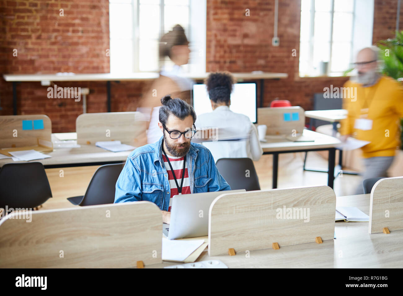 Working in open space office Stock Photo - Alamy