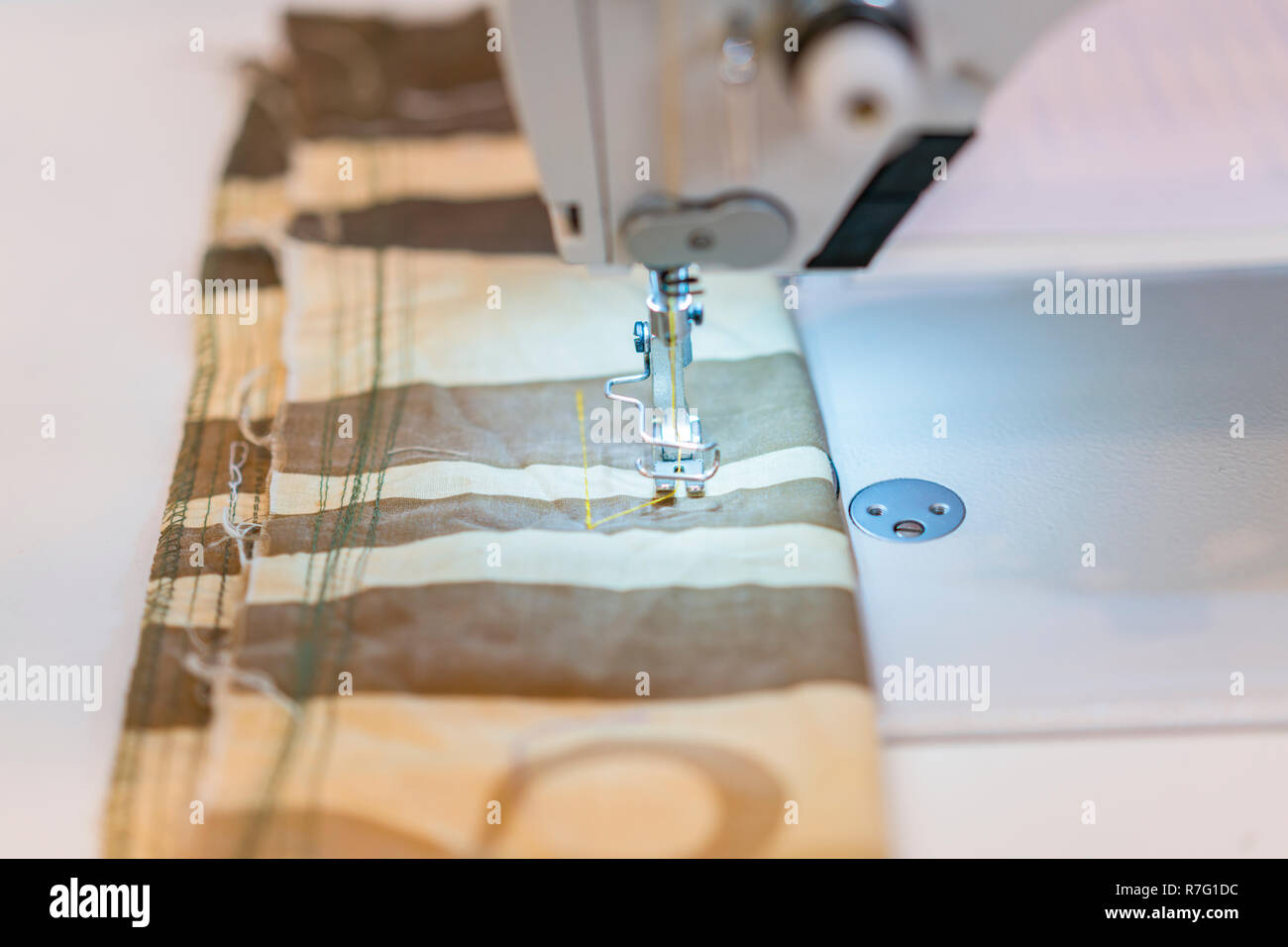Close up of a professional typewriter for tailoring at a manufacturing ...
