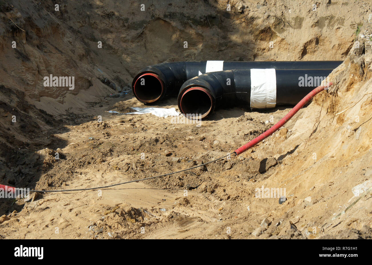 Construction work. Repair of communications Stock Photo - Alamy