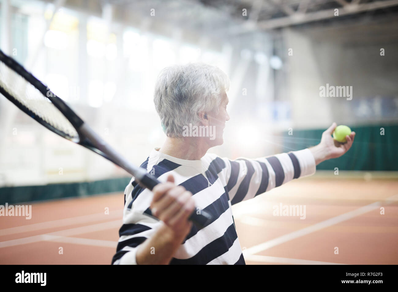 Going to hit tennis ball Stock Photo