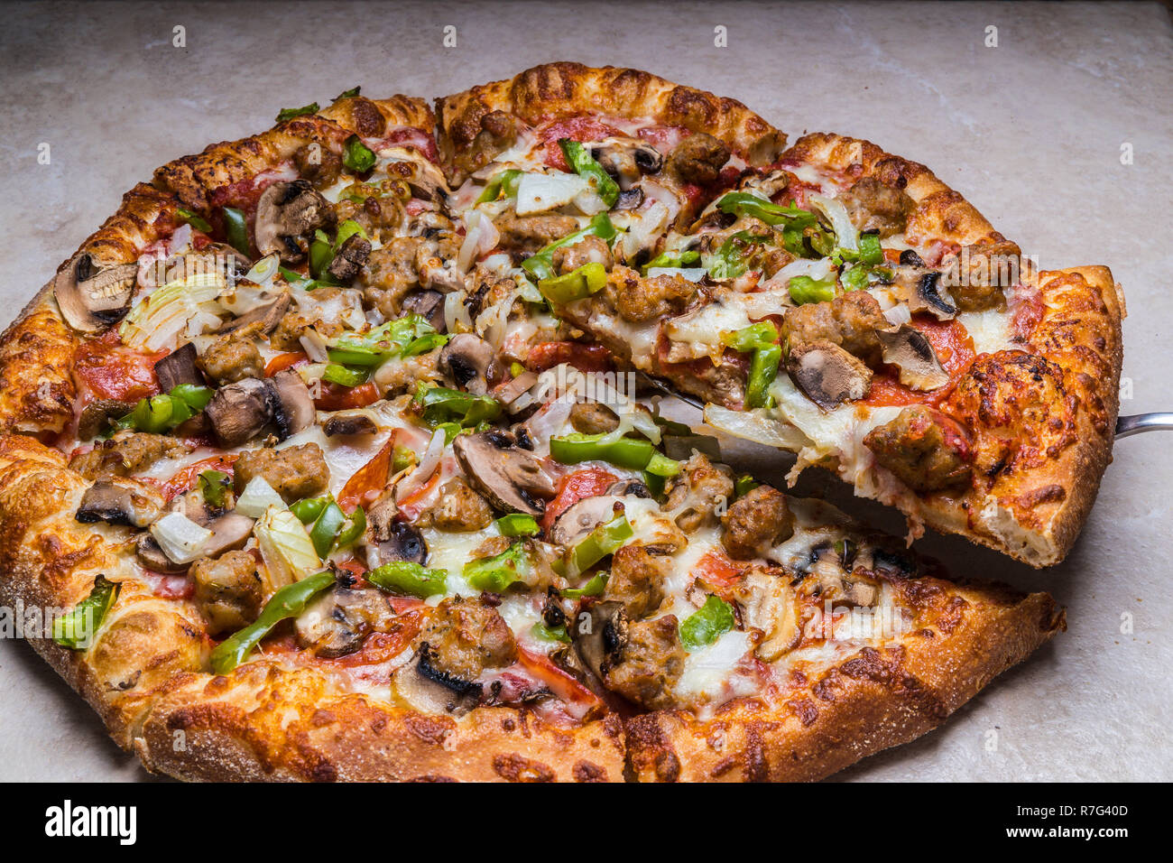 deluxe uno pizza with cheese,green peppers,italian sausage,mushrooms ...