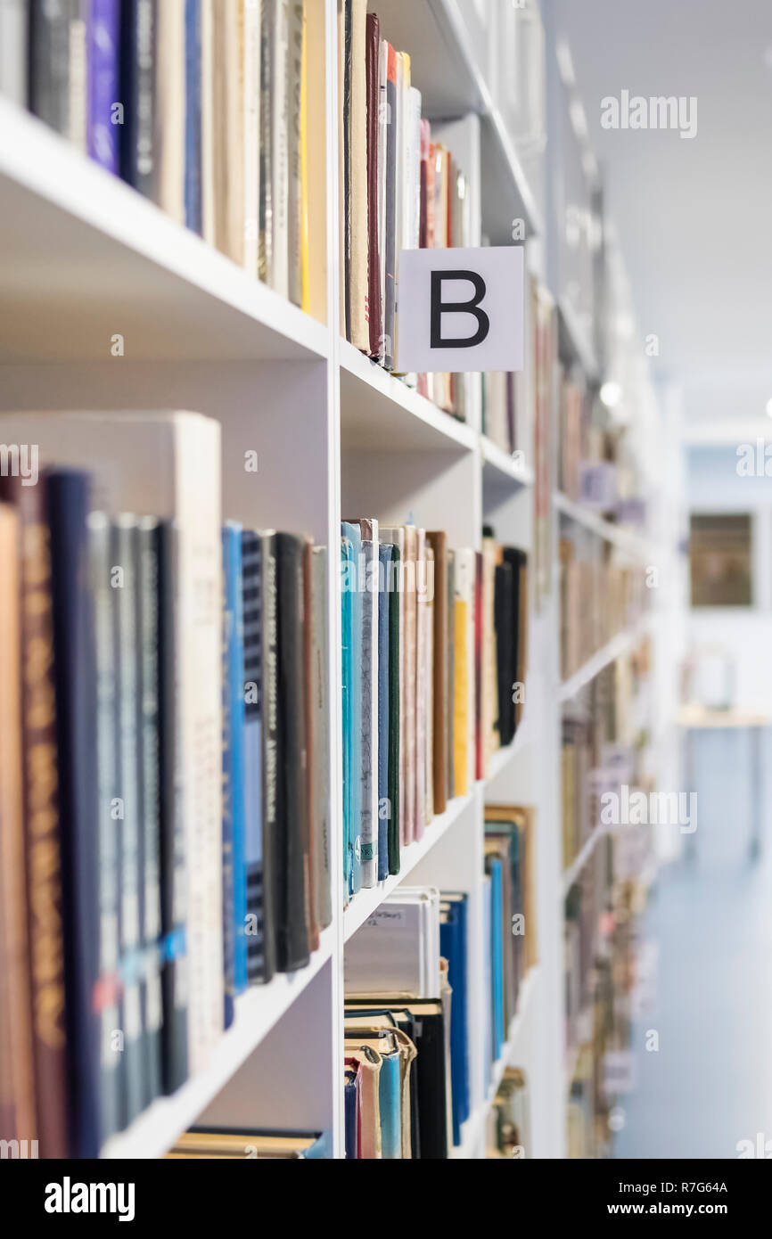 Library interior bookshelves nobody hires stock photography and images