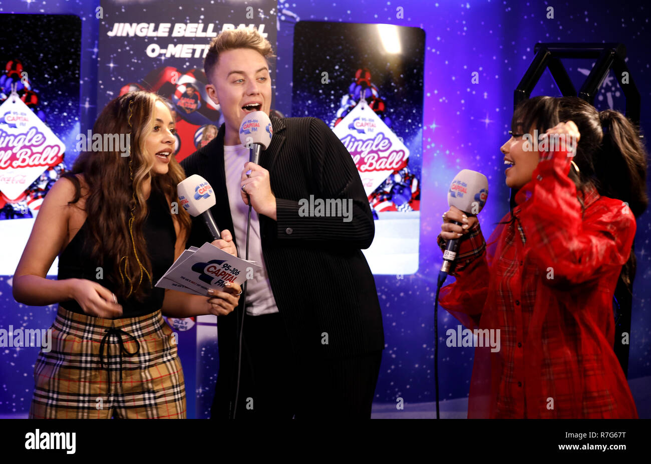 Jade Thirlwall and Leigh-Anne Pinnock (right) of Little Mix backstage