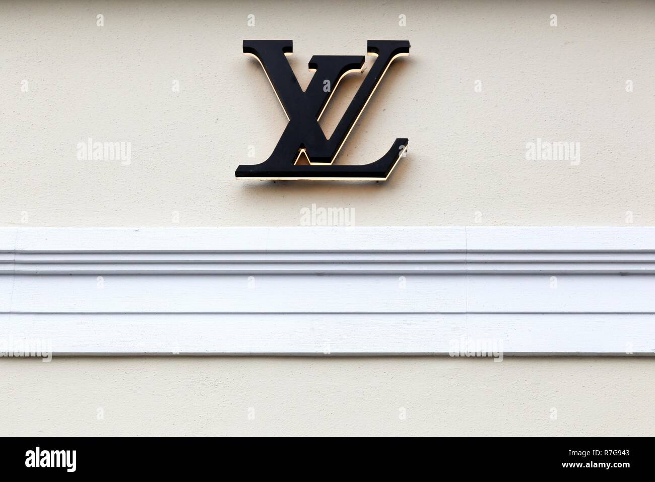 Copenhagen, Denmark, October 21, 2018: Louis Vuitton sign on a wall. Louis Vuitton is a French company specialized in fashion accessories Stock Photo