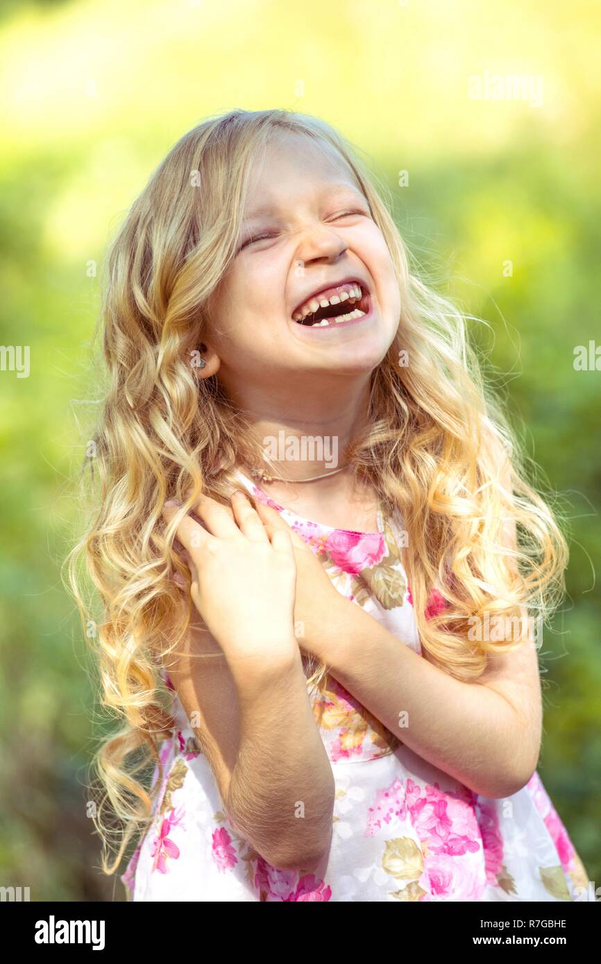 portrait smiling little girl in the forest, summer Stock Photo - Alamy