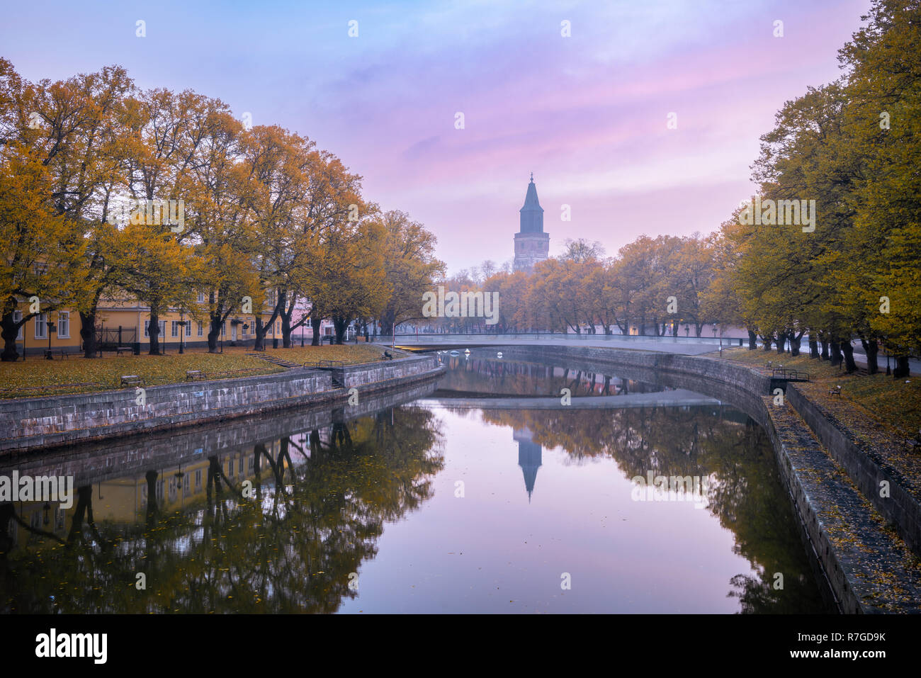 Aura river and beautiful fall foliage with Turku Cathedral in the background in Turku, Finland Stock Photo
