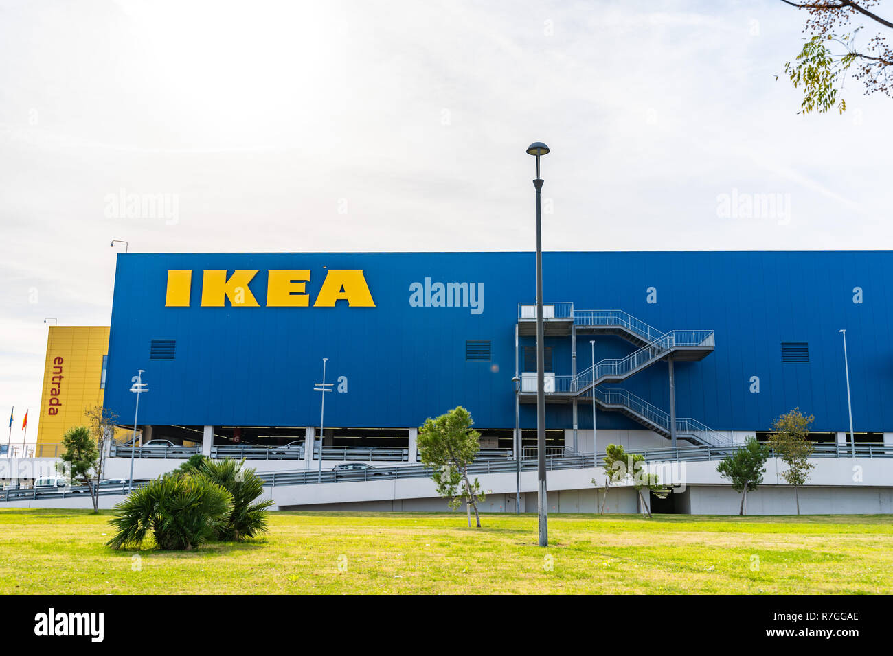 Valencia,Spain - December 09, 2018: Ikea store lot in Alfafar, Valencia. Big yellow Ikea word on blue background. Skyes on the top. Exterior view. Stock Photo