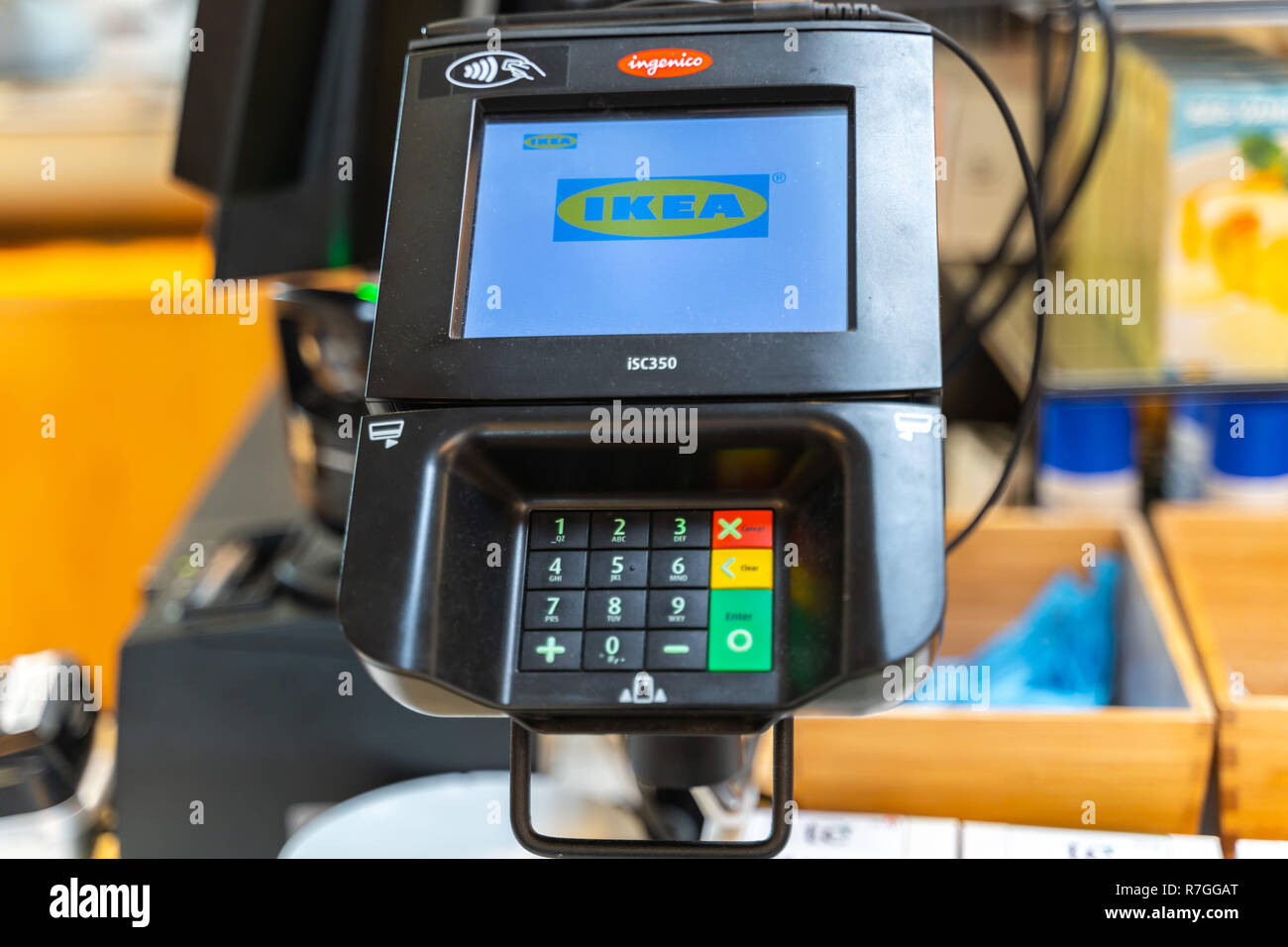 Valencia,Spain - December 09, 2018: Ikea store lot in Alfafar, Valencia. Credit card paymenet terminal (POS Machine) with Ikea name on the screen. Co Stock Photo