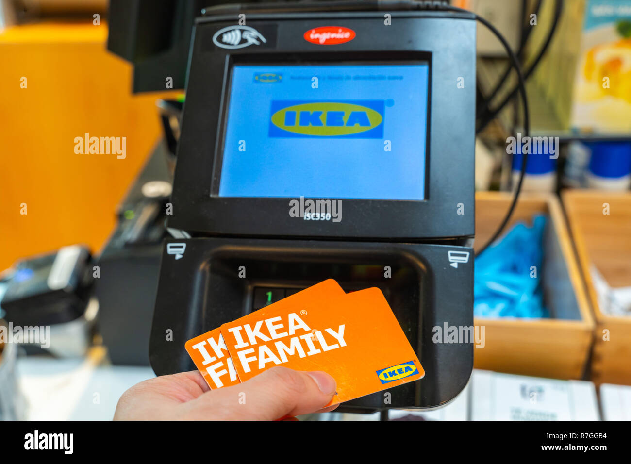 Valencia,Spain - December 09, 2018: Ikea store lot in Alfafar, Valencia. Credit card paymenet terminal (POS Machine) with Ikea name on the screen. Con Stock Photo