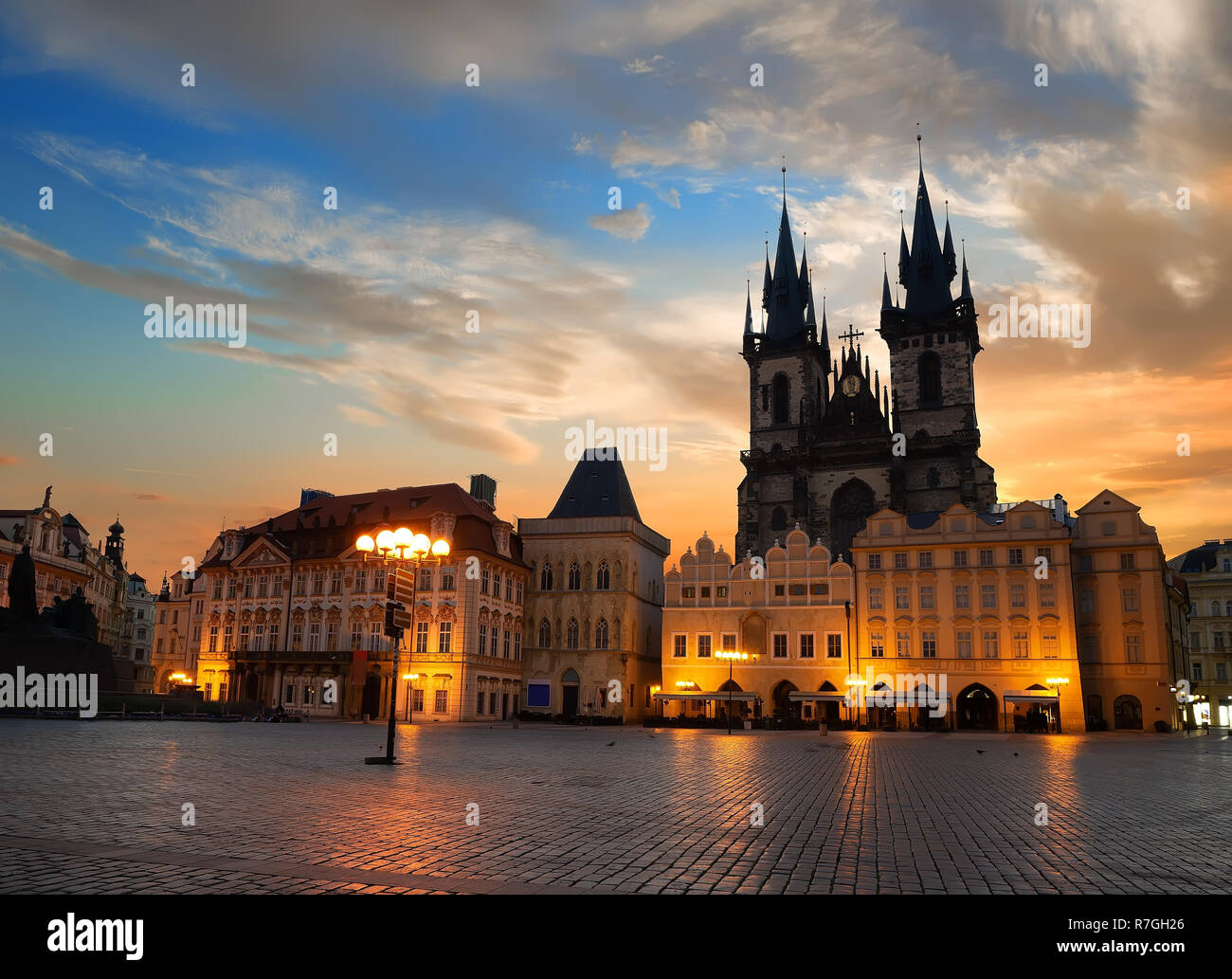 Prague Old Town square illuminated at sunrise Stock Photo