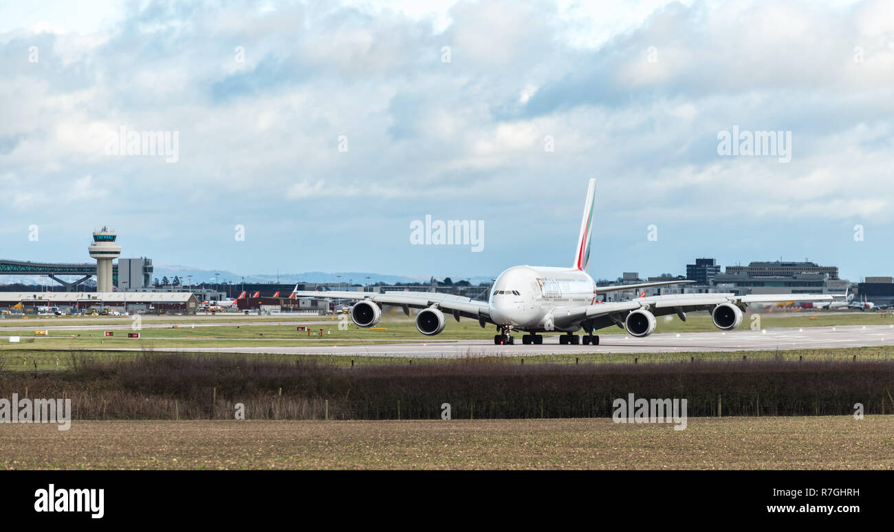 GATWICK AIRPORT, ENGLAND, UK – DECEMBER 09 2018: An Emirates Airline A380 Airbus slows down after landing at London Gatwick Airport Stock Photo