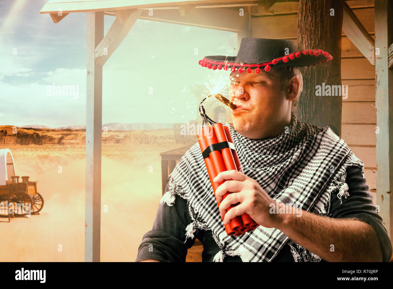 Fearless Cowboy Lights A Cigar From A Stick Of Dynamite Harsh Wild West Adventure In Western Country Stock Photo Alamy
