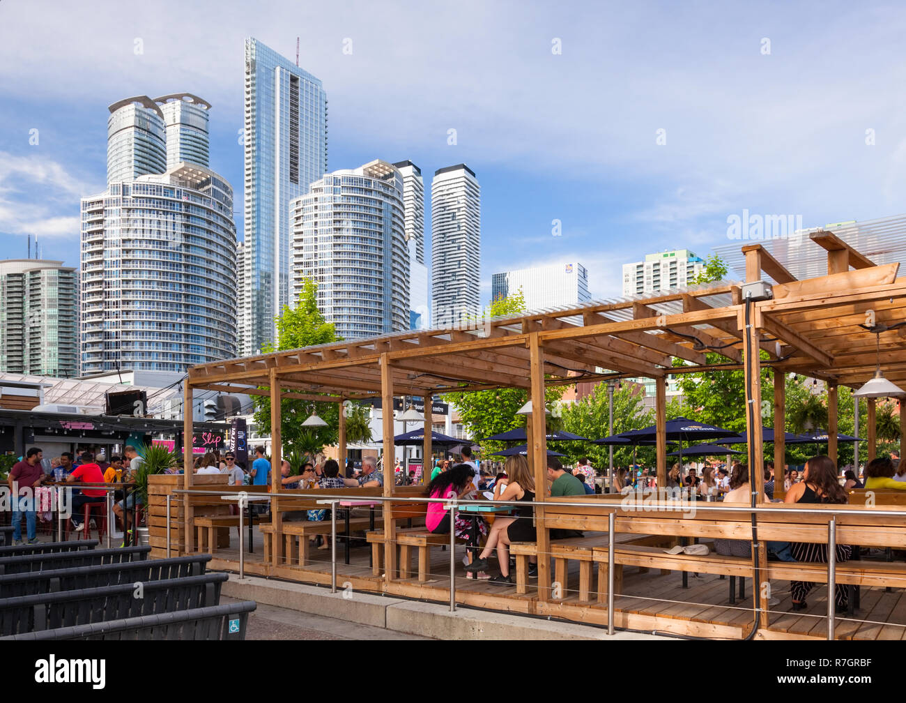 An outdoor patio for the restaurant called The Slip at Harbourfront Centre. City of Toronto, Ontario, Canada. Stock Photo