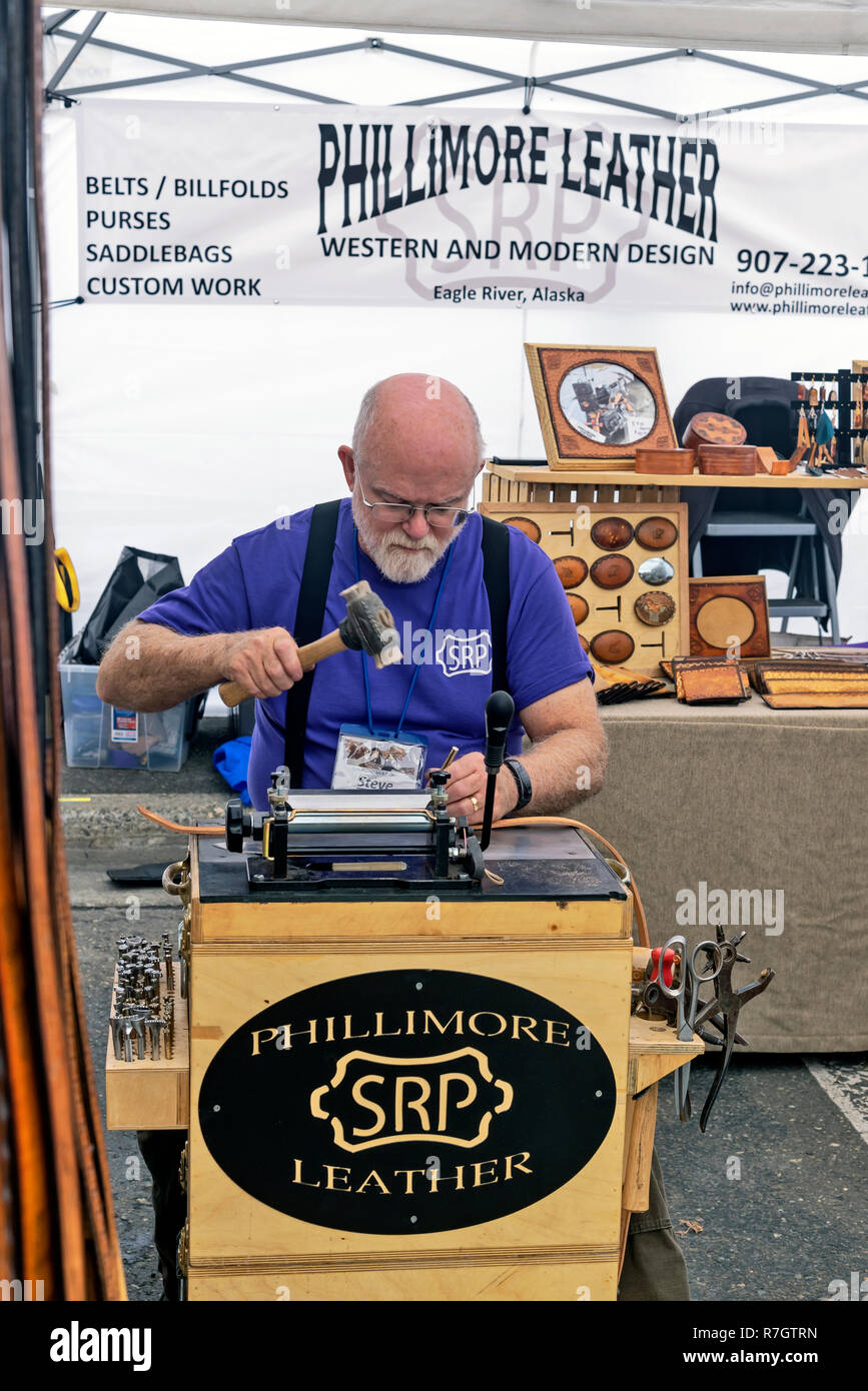 Master of leather goods at work, Anchorage Fair and Festival, Alaska, USA Stock Photo