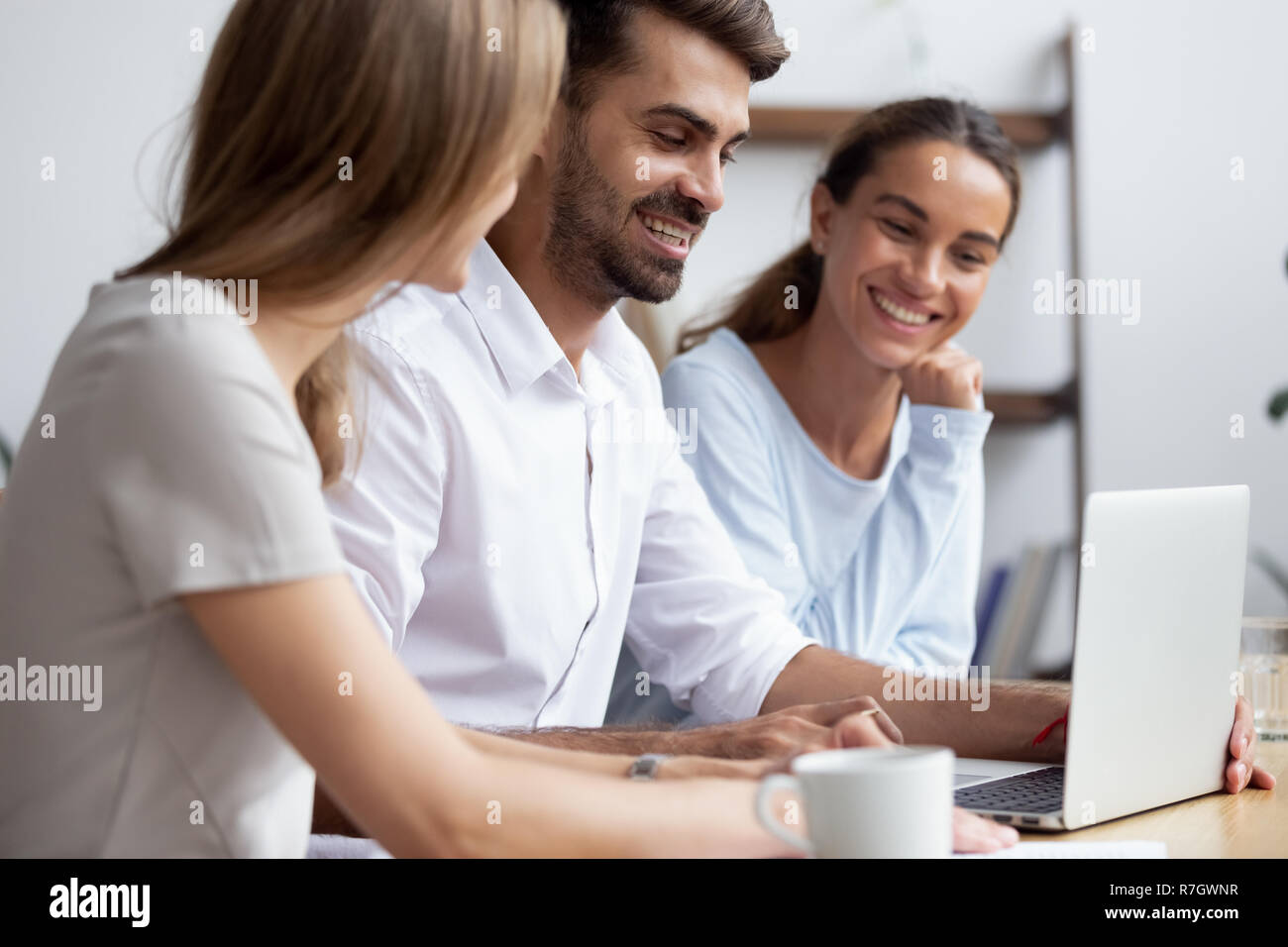 Diverse young multiracial colleagues working together in office Stock Photo