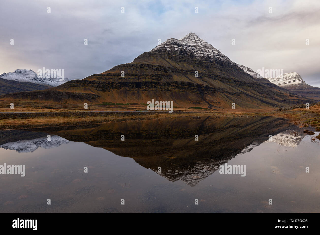 Bulandstindur peak reflected in a lake, Djupivogur, Iceland Stock Photo