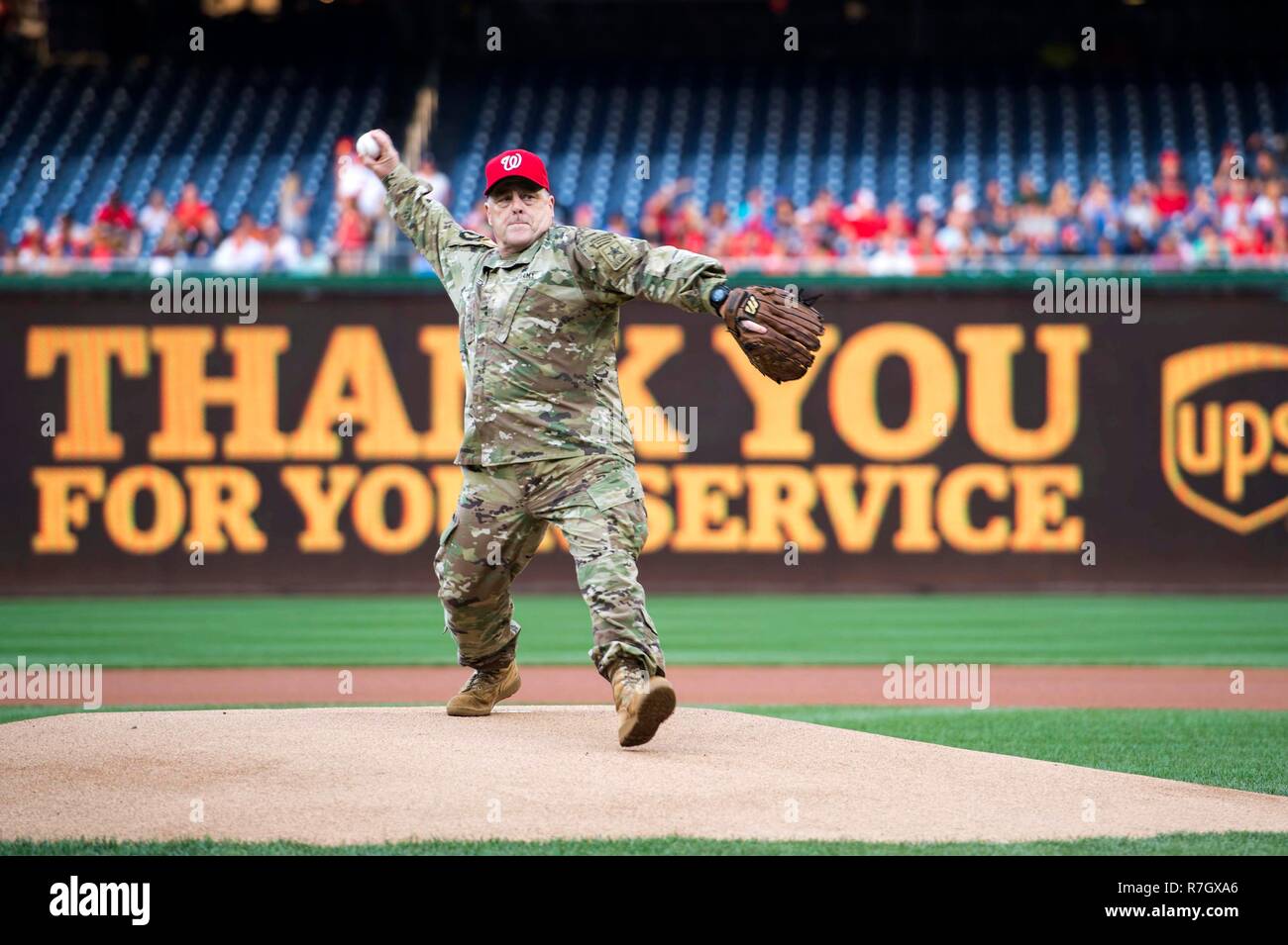 U.S. Army Chief of Staff Gen. Mark Milley throws out the first pitch for the Washington Nationals baseball game during Army Day at Nationals Park June 28, 2016 in Washington, DC. Milley was chosen by President Donald Trump on December 8, 2018 to be the next Chairman of the Joint Chiefs. Stock Photo