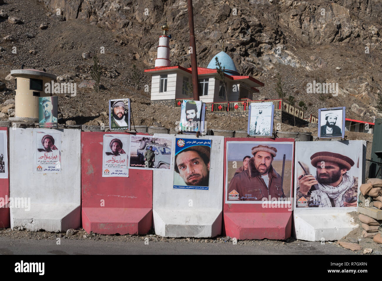 Concrete Blocks with portraits of Commander Massoud's followers at the Entrance of Panjshir Valley, Panjshir Province, Afghanistan Stock Photo