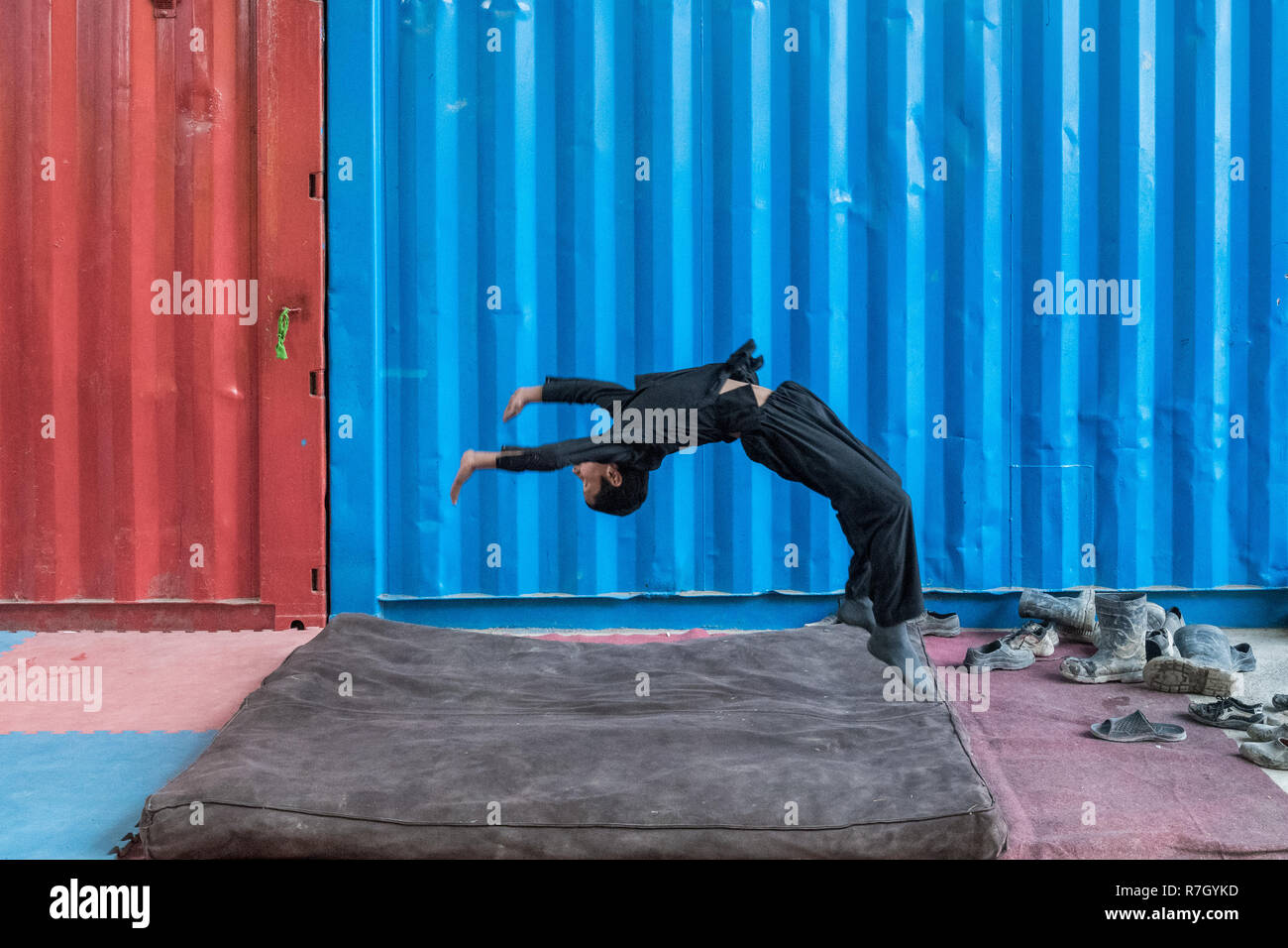 Boy Training At Mobile Mini Circus for Children, an NGO Initiative, Kabul, Kabul Province, Afghanistan Stock Photo