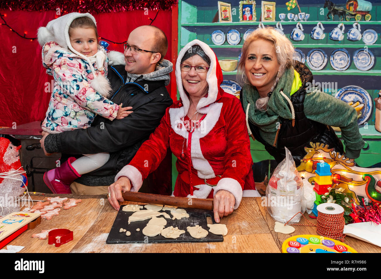 Leap, West Cork, Ireland. 9th Dec, 2018. Santa is appearing at Leap Land up until Christmas.  Leap Land is an annual event facilitated by Ger of the world-famous Ger's Wild Atlantic Diner in Leap.  Helping Mrs Claus with her baking this evening were Alex Siran, Nela Horrathova and Monika Horrathova, all from Clonakilty. Credit: Andy Gibson/Alamy Live News. Stock Photo