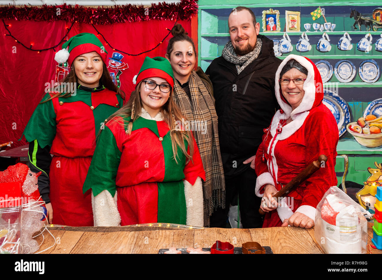 Leap, West Cork, Ireland. 9th Dec, 2018. Santa is appearing at Leap Land up until Christmas.  Leap Land is an annual event facilitated by Ger of the world-famous Ger's Wild Atlantic Diner in Leap.  Helping Mrs Claus with her baking this evening were elves Laura Roycroft and Maebh Barry with Mairead Finn and Michael Collins, both from Cork. Credit: AG News/Alamy Live News. Stock Photo