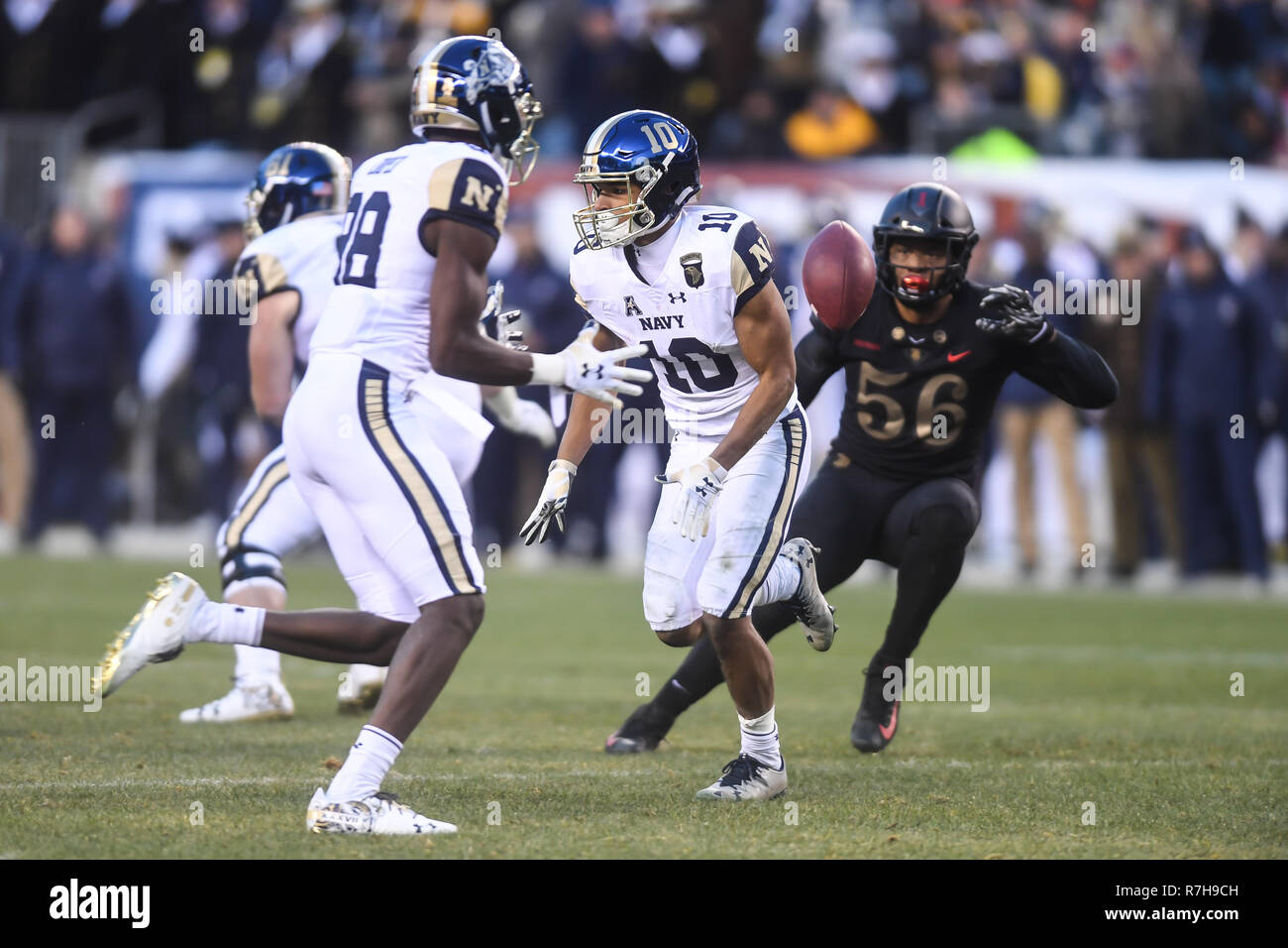 Philadelphia, Pennsylvania, USA. 8th December, 2018.Navy Quarterback MALCOM PERRY (10) lobs the football to MYCHAL COOPER (88) during the game held at Lincoln Financial Field in Philadelphia, Pennsylvania. Credit: Amy Sanderson/ZUMA Wire/Alamy Live News Stock Photo