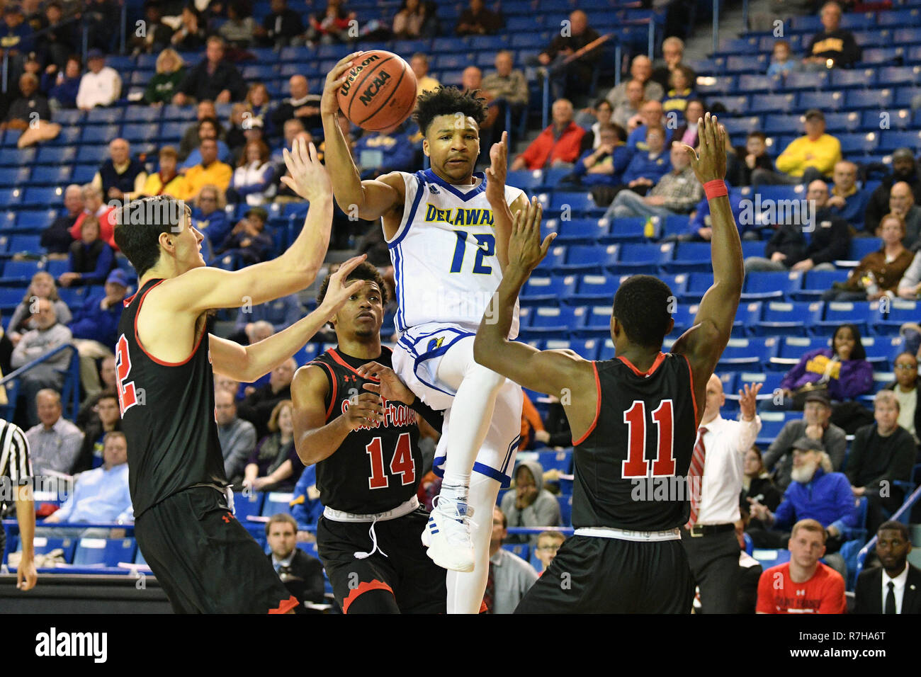 Newark, Delaware, USA. 9th Dec, 2018. DDelaware Fightin Blue Hens guard ITHIEL HORTON (12) goes up between a double team during the basketball game played at the Bob Carpenter Center in Newark, DE. The Blue Hens beat the Red Flash 88-83. Credit: Ken Inness/ZUMA Wire/Alamy Live News Stock Photo