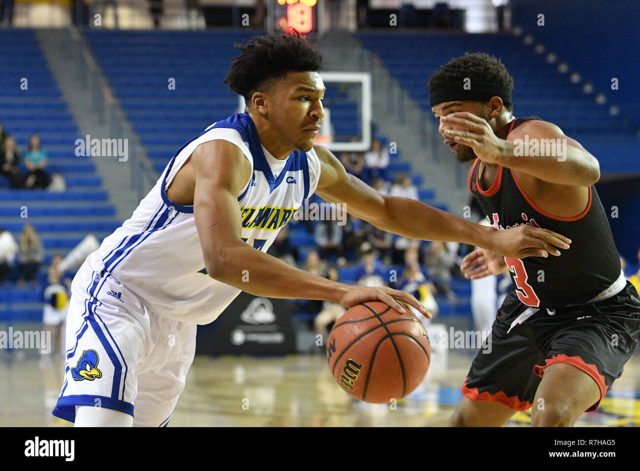 Newark, Delaware, USA. 9th Dec, 2018. Delaware Fightin Blue Hens guard ITHIEL HORTON (12) tries to drive by St. Francis (Pa) Red Flash guard JAMAAL KING (3) during the basketball game played at the Bob Carpenter Center in Newark, DE. The Blue Hens beat the Red Flash 88-83. Credit: Ken Inness/ZUMA Wire/Alamy Live News Stock Photo