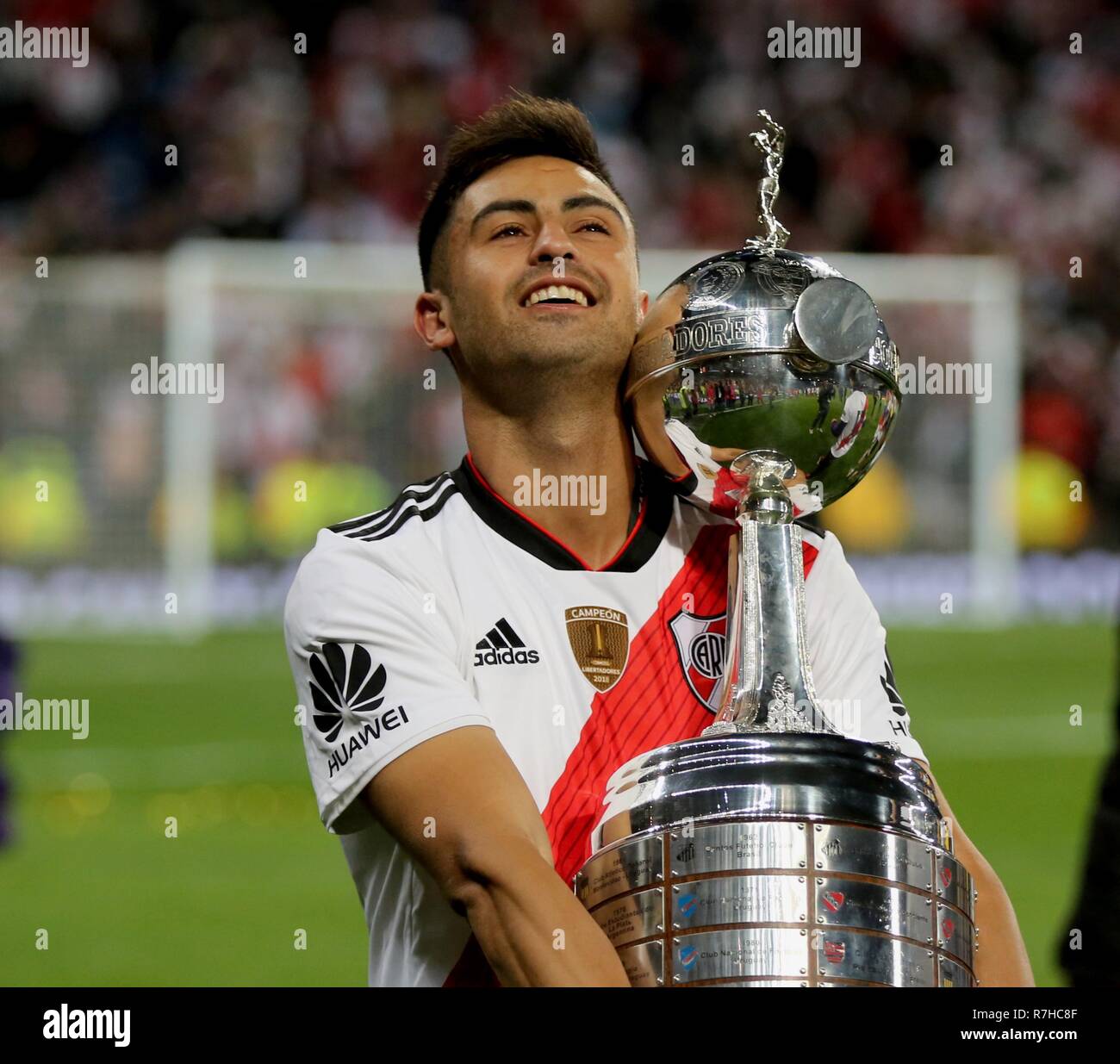 Madrid, Spain. 09th Dec, 2018. Football: Copa Libertadores, Final, River Plate - Boca Juniors in the Santiago Bernabeu stadium. River Plate's Gonzalo Martinez rejoices after winning the match with the trophy. Credit: Cezaro de Luca/dpa/Alamy Live News Stock Photo