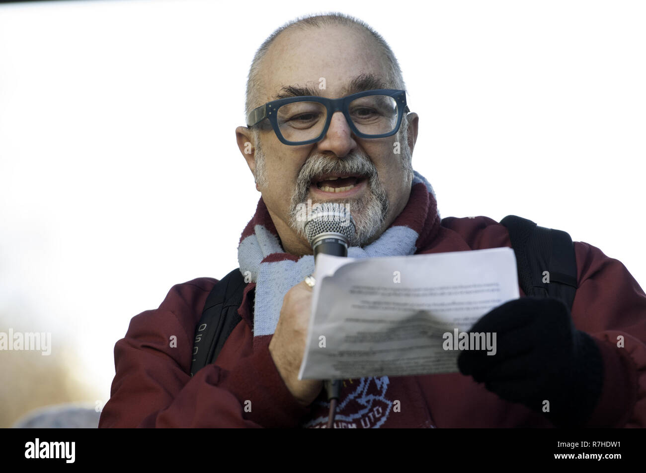 London, Greater London, UK. 9th Dec, 2018. David Rosenberg, Jewish Socialist Group speaks at an anti-racist counter protest against the 'Brexit Betrayal March'. Thousands of people took to the streets in central London to march against the 'Brexit Betrayal March' organised by Tommy Robinson and UKIP. Counter Protesters made their way from Portland Place to Whitehall, where speakers addressed the crowd. During the counter demonstration, there was a strong police presence. A group of counter protesters, who became separated from the main protest, were corralled by police to av Stock Photo